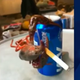 Illustration for article titled Crawfish hanging on a beer can smoking a cigarette is this weekend's mascot